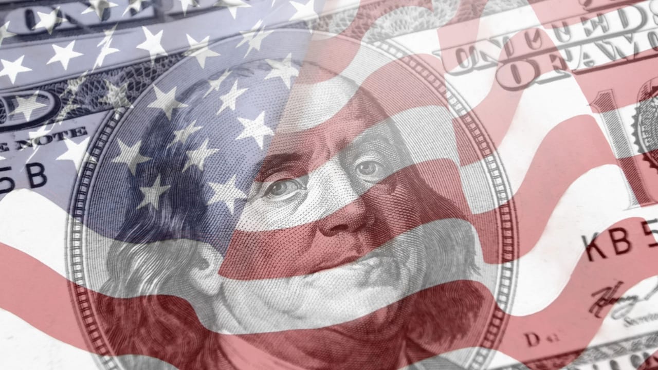 Harris Endorses Biden’s Tax Proposal, Including New Taxes on Home Sales - american flag money dp241725840