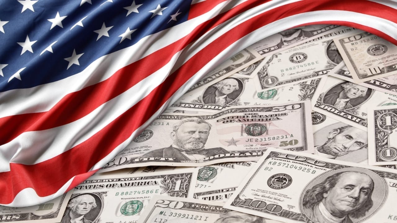 Harris Endorses Biden’s Tax Proposal, Including New Taxes on Home Sales - american flag money dp249622932