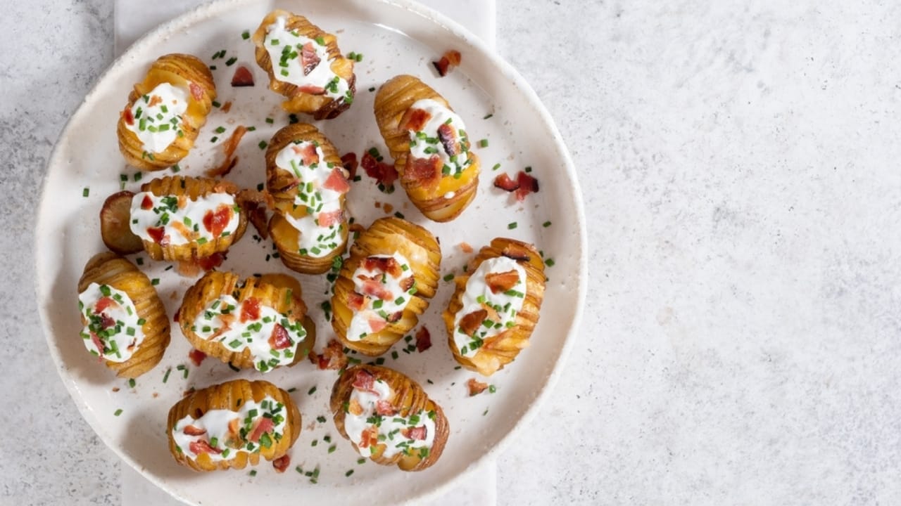 10 Tips for Baking Potatoes Like a Pro—And a Microwave Method When You’re in a Pinch 10 10 Tips for Baking Potatoes Like a Pro—And a Microwave Method When You’re in a Pinch - baked potato ss2312759871