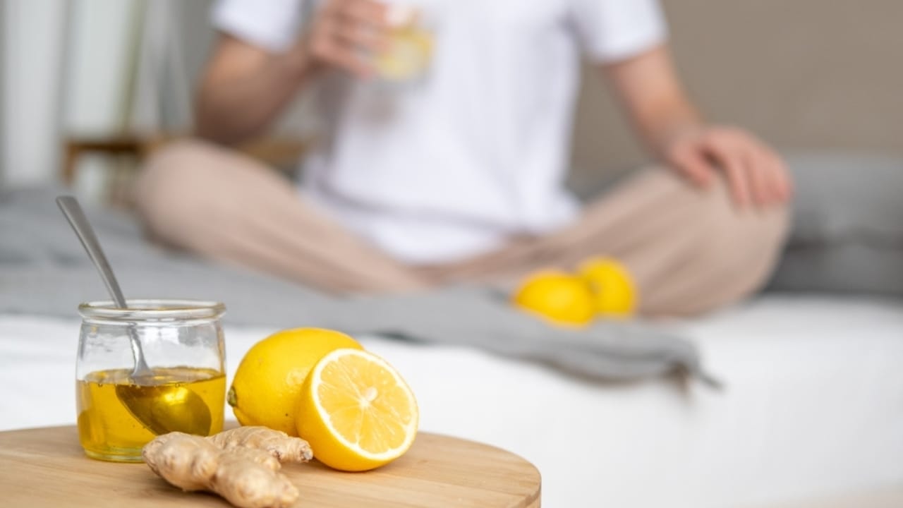 Calm Your Bronchitis Cough with These 12 Simple Home Remedies - drinking water with honey lemon ginger ss2113257260