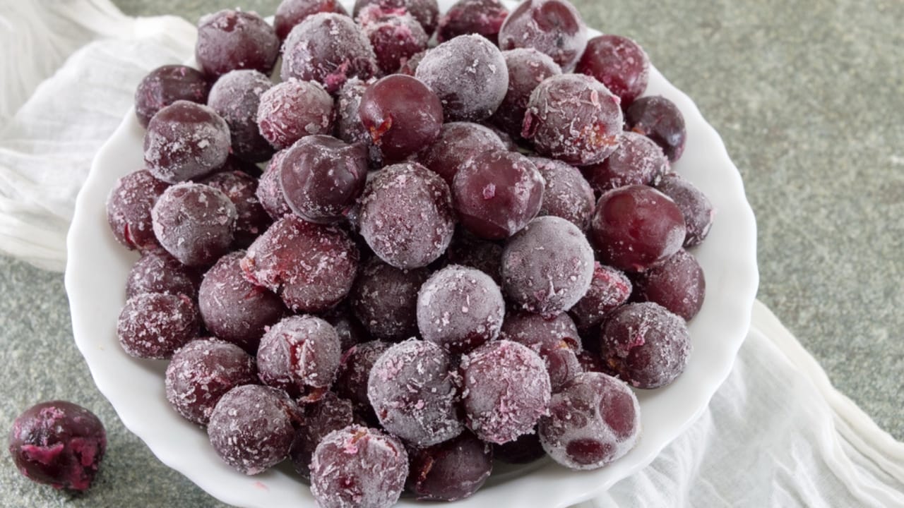 16 Foods You’d Never Guess Freeze Well—But They Do 13 16 Foods You’d Never Guess Freeze Well—But They Do - frozen grapes dp121254776