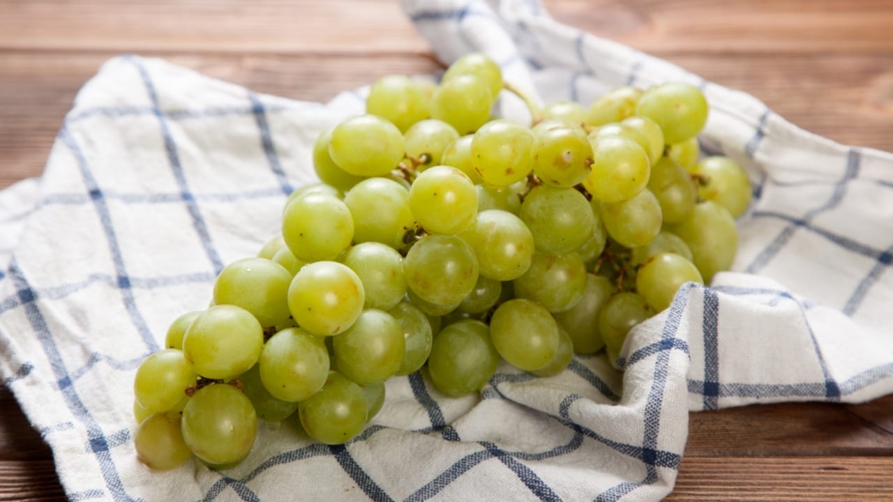 Keep Your Grapes Fresh for a Month Using This 5-Step Method - grapes on towel dp95364780