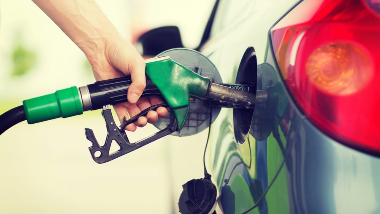 15 Barter Items to Stockpile for Economic Hard Times 11 15 Barter Items to Stockpile for Economic Hard Times - man pumping gasoline fuel in car dp48646899