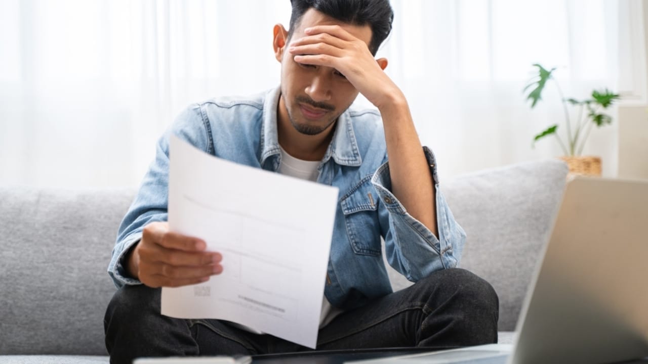 15 Situations Where Unenforceable HOA Rules Deserve to Be Challenged - man sad stress ss2372720799