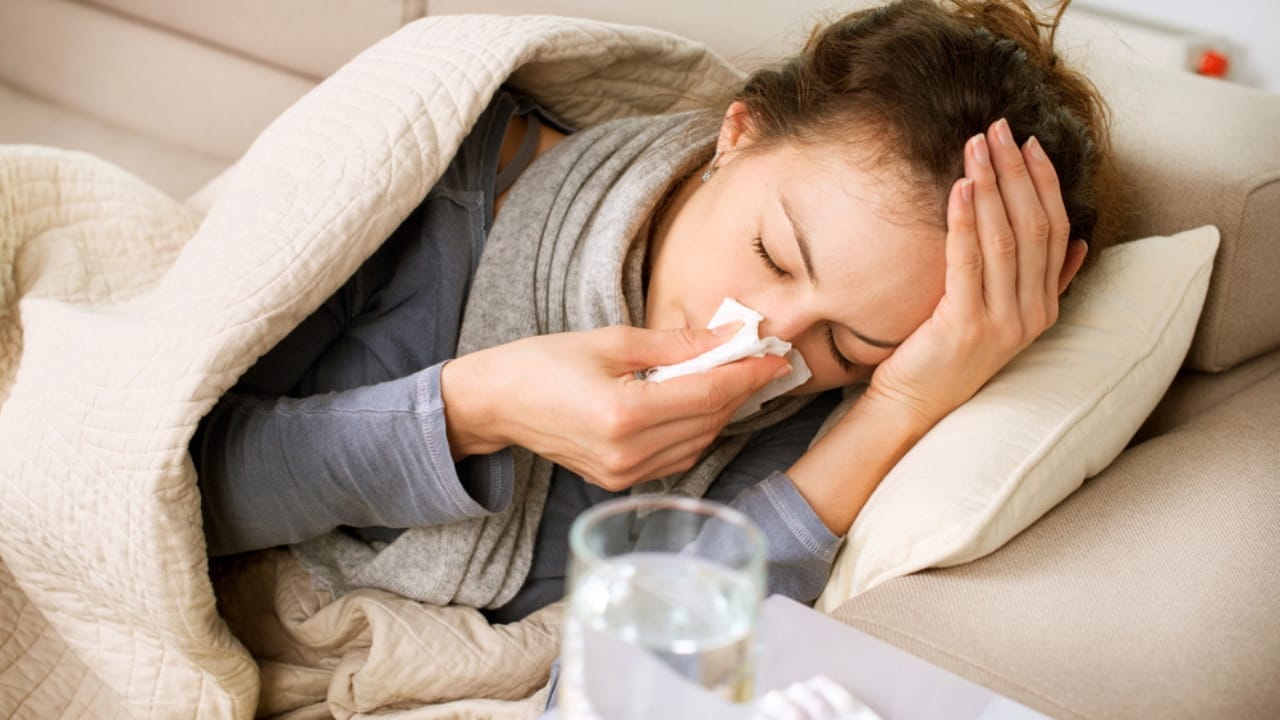 10 Health Benefits of Honey That Will Sweeten Your Life - sick woman flu dp16276055