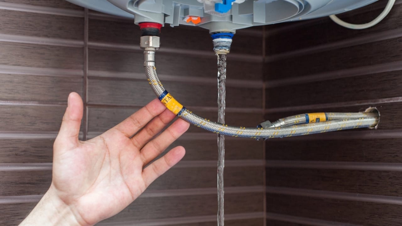 20 DIY Fixes Anyone Can Do to Save Money 14 20 DIY Fixes Anyone Can Do to Save Money - water heater repair dp105044628
