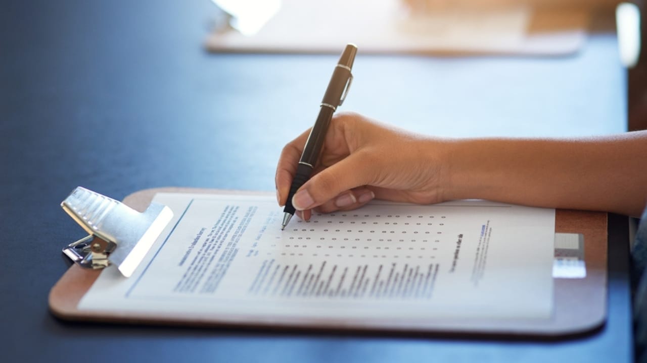 15 Situations Where Unenforceable HOA Rules Deserve to Be Challenged - woman answering survey ss2304753947