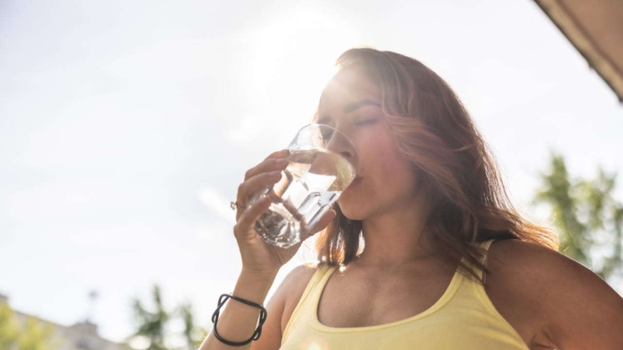 64% Chance Your Bottled Water is Just Expensive Tap Water 7 64% Chance Your Bottled Water is Just Expensive Tap Water - woman drinking water ss2479841761