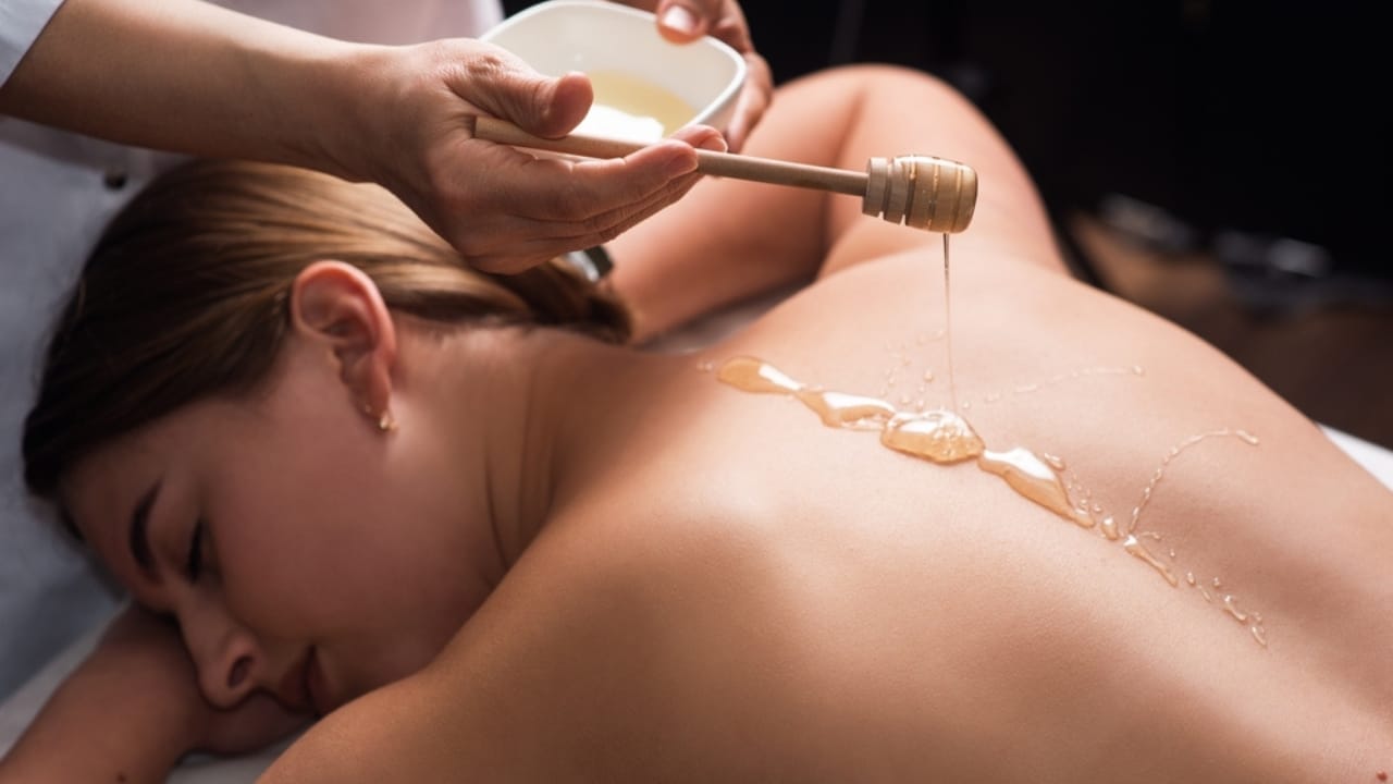 10 Health Benefits of Honey That Will Sweeten Your Life - woman massage with honey ss2264244335