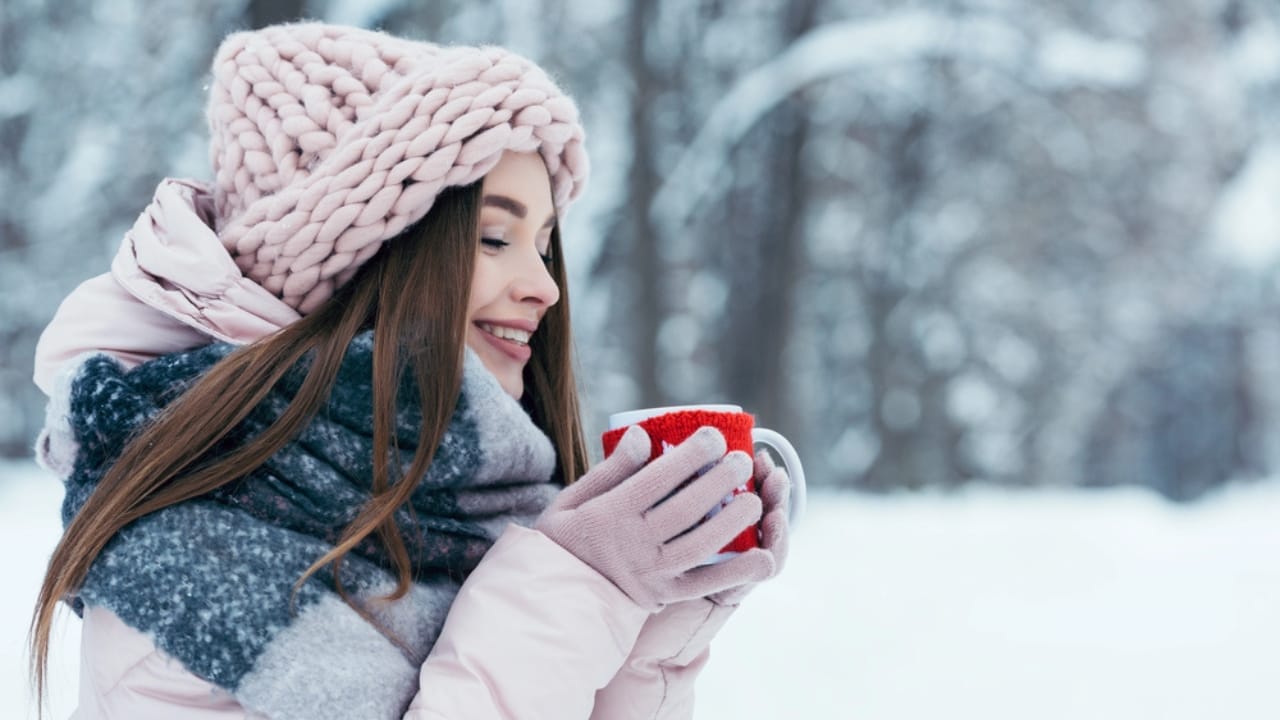 12 Unexpected Reasons Why People are Fleeing California 10 12 Unexpected Reasons Why People are Fleeing California - woman winter cup of coffee dp178557330