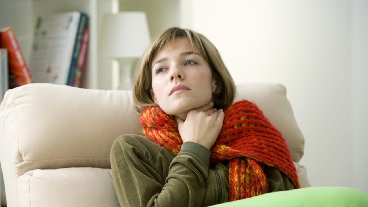 10 Health Benefits of Honey That Will Sweeten Your Life - woman with sore throat sick dp44393283