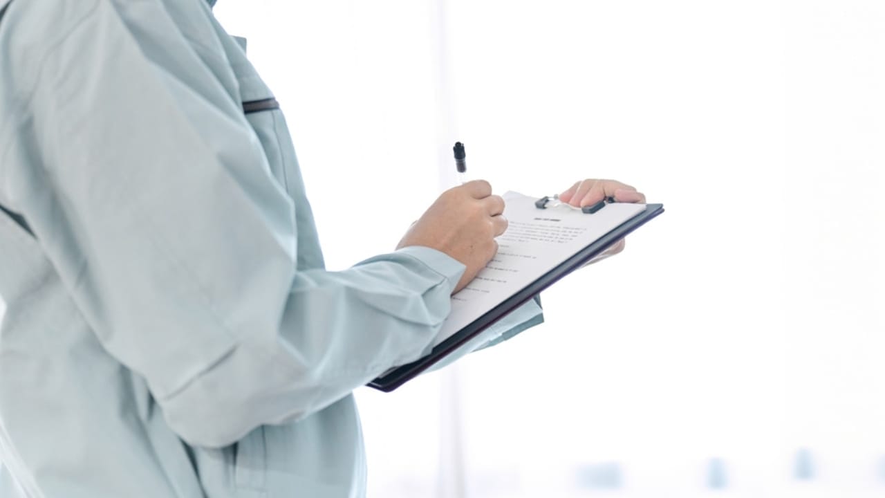 15 Situations Where Unenforceable HOA Rules Deserve to Be Challenged - worker doing inspection ss2407662257