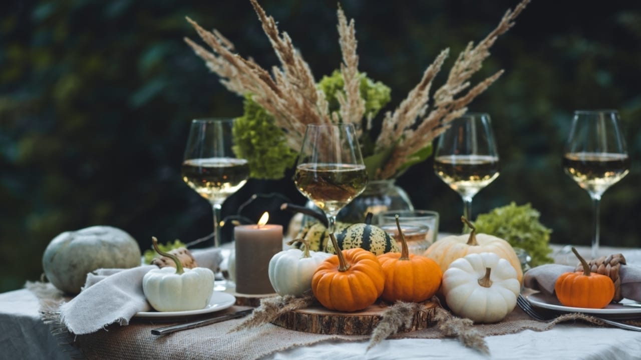 29 Fall Decor Tips for a Warm, Comfy & Inviting Home 13 29 Fall Decor Tips for a Warm, Comfy & Inviting Home - Fall Dining Table Arrangement with pumpkin ss2370793841