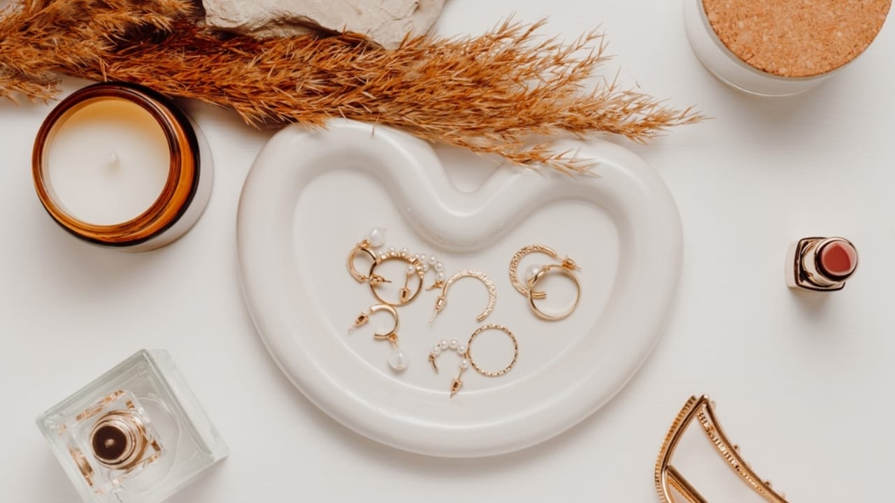 Stop Storing These 15 Things in the Bathroom—Here’s Why - Jewelry Tray with accessories ss2516412495