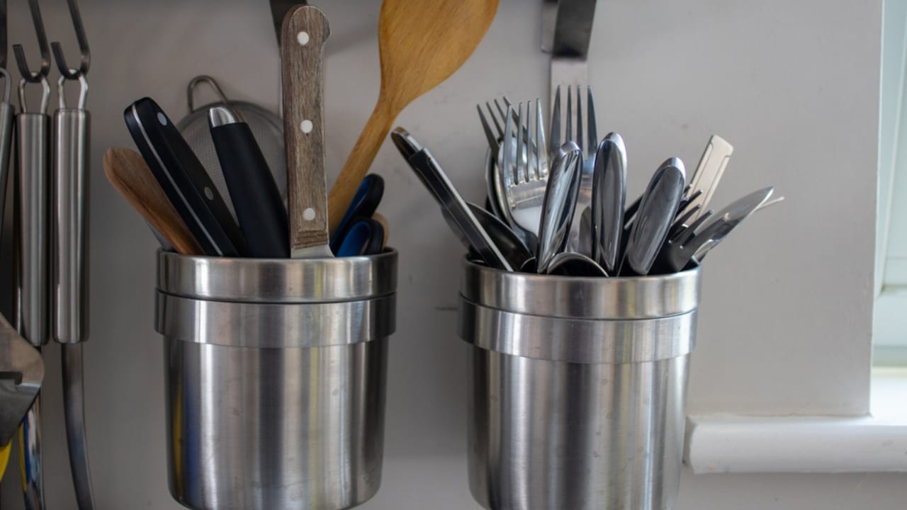 13 Countertop Items to Ditch for a Sleeker, Designer-Approved Kitchen 6 13 Countertop Items to Ditch for a Sleeker, Designer-Approved Kitchen - Utensil Crocks ss1813961225