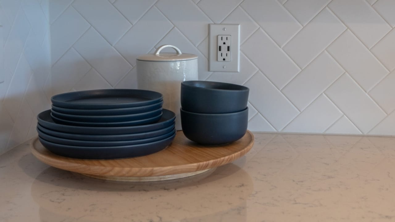 Declutter Your Home in a Flash with These 18 Everyday Items 9 Declutter Your Home in a Flash with These 18 Everyday Items - bowl and plates on Lazy Susan tray ss2449795207