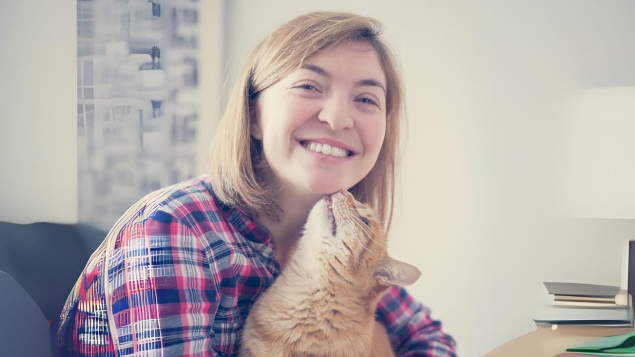 Cats Aren’t Just Cute—Here Are 20 Life-Changing Benefits - cat kissing lady dp289297952