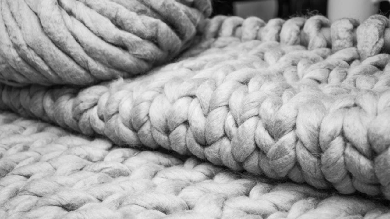 Cozy Fireplace Vibes: 25 Fall Mantel Decor Ideas for 2024 9 Cozy Fireplace Vibes: 25 Fall Mantel Decor Ideas for 2024 - chunky knit throw blanket ss1266850558