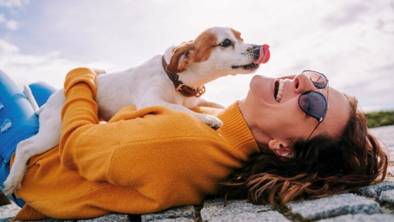 15 Dog Behaviors You’re Probably Misunderstanding 10 15 Dog Behaviors You’re Probably Misunderstanding - dog licking face ss1829212376