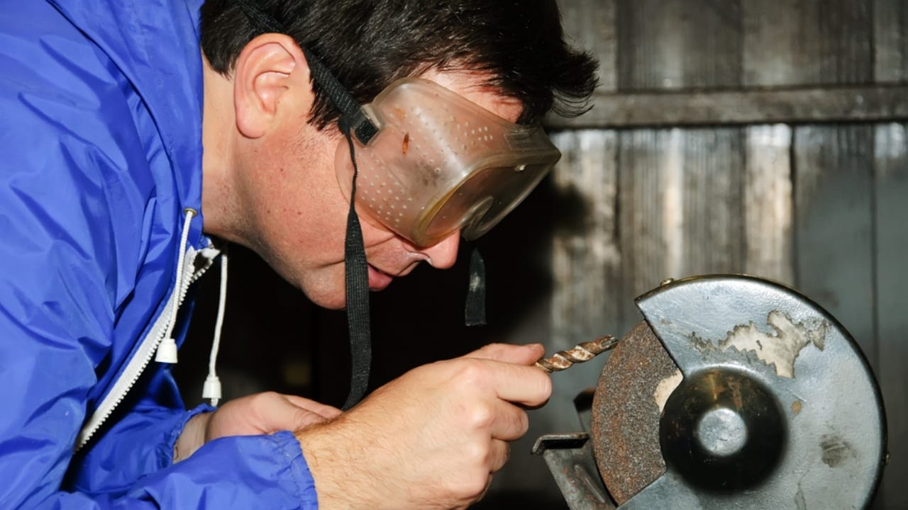 Bring Your Dull Drill Bits Back to Life with These Pro Sharpening Techniques 7 Bring Your Dull Drill Bits Back to Life with These Pro Sharpening Techniques - man sharpening drill bits ss34701691