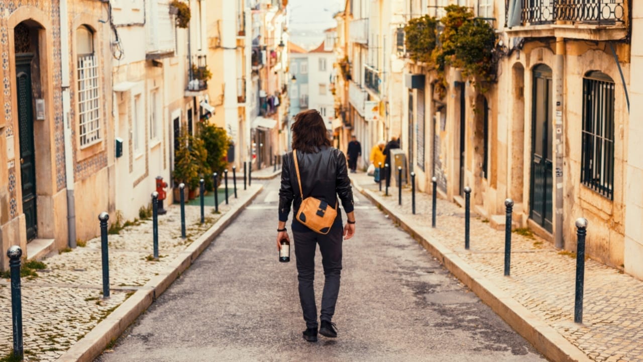 15 Stealth Strategies to Survive & Thrive in Urban Chaos 5 15 Stealth Strategies to Survive & Thrive in Urban Chaos - man walking through the narrow street ss1577805256