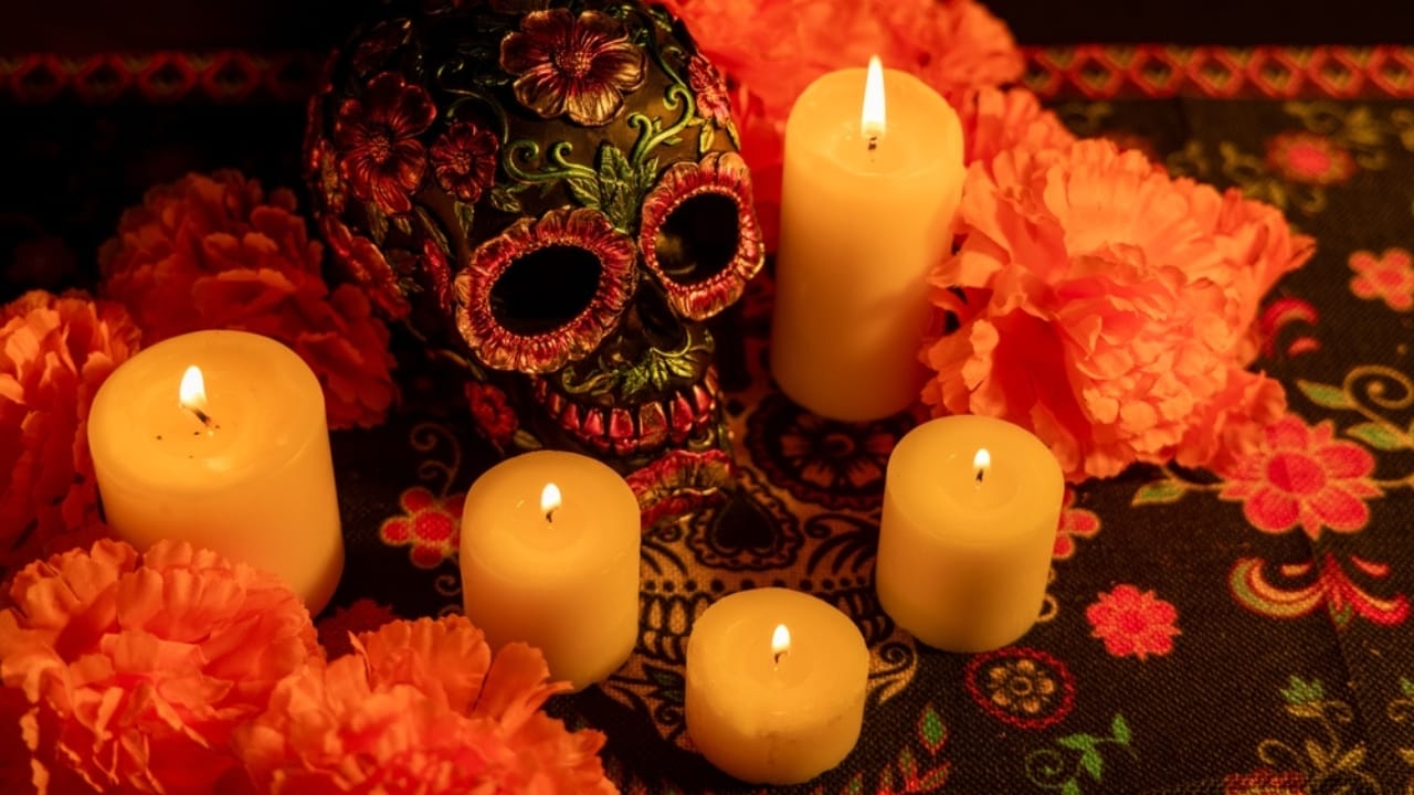 Cozy Fireplace Vibes: 25 Fall Mantel Decor Ideas for 2024 13 Cozy Fireplace Vibes: 25 Fall Mantel Decor Ideas for 2024 - skull decorated metallic flowers and marigolds autumn holloween ss2506973243