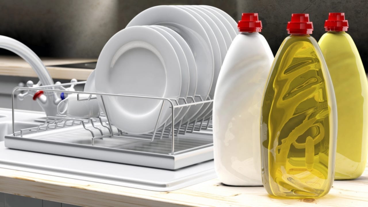 13 Countertop Items to Ditch for a Sleeker, Designer-Approved Kitchen 3 13 Countertop Items to Ditch for a Sleeker, Designer-Approved Kitchen - soap bottle cointainer in kitchen dp245494164