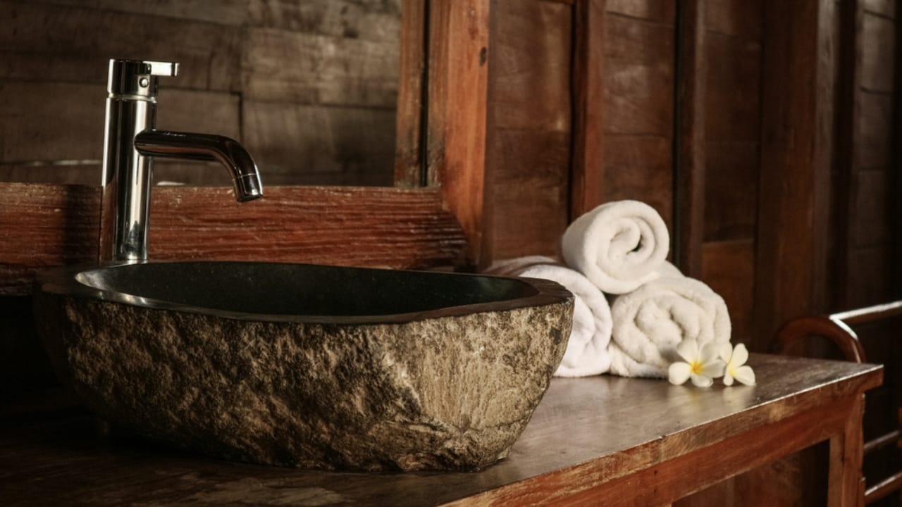 18 Stylish Ways to Turn Your Bathroom into a Japandi Zen Haven 17 18 Stylish Ways to Turn Your Bathroom into a Japandi Zen Haven - Bathroom with stone washbasin dp426575062