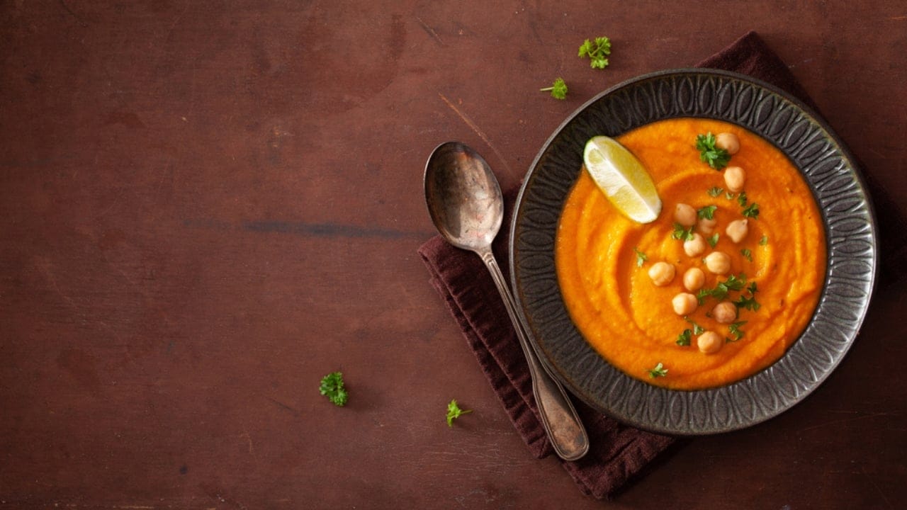 10 High-Protein Soups That Make Weight Loss Feel Like Comfort Food - Curried Carrot Tomato Soup with Chickpea Gremolata dp236043608