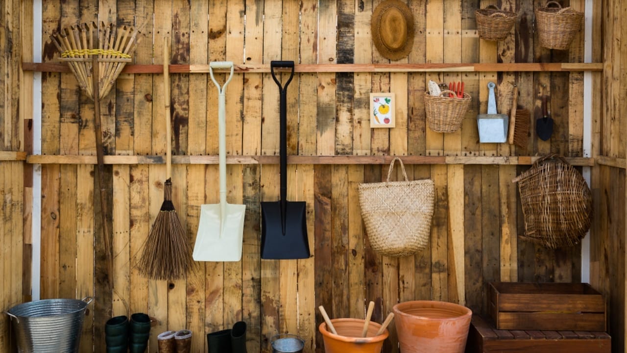 Maximize Your Garage Space with These 18 Simple DIY Organization Projects 7 Maximize Your Garage Space with These 18 Simple DIY Organization Projects - Garden Tool Storage ss1044808657
