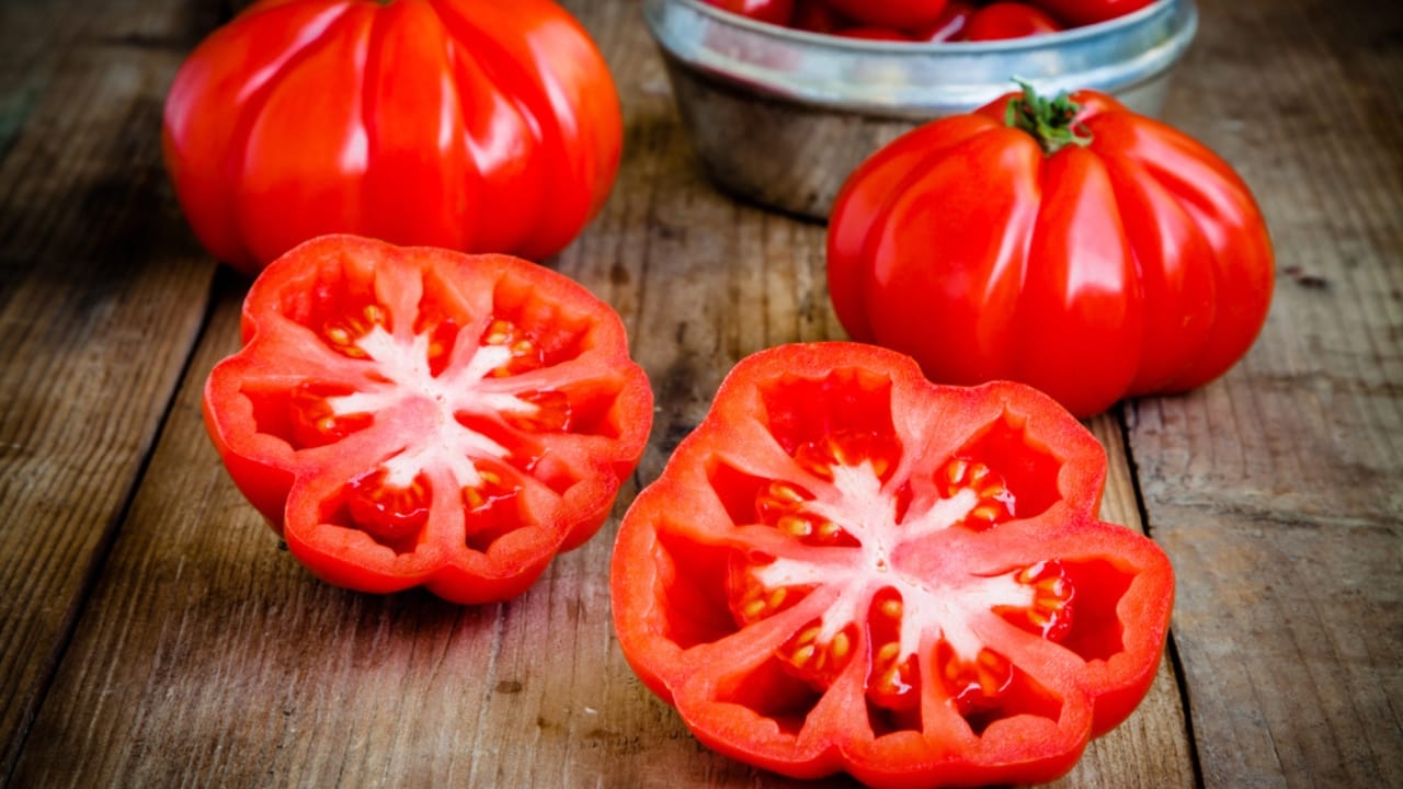 15 Profitable Plants That Could Add Thousands to Your Bank Account Yearly 16 15 Profitable Plants That Could Add Thousands to Your Bank Account Yearly - Heirloom Tomatoes dp49729817