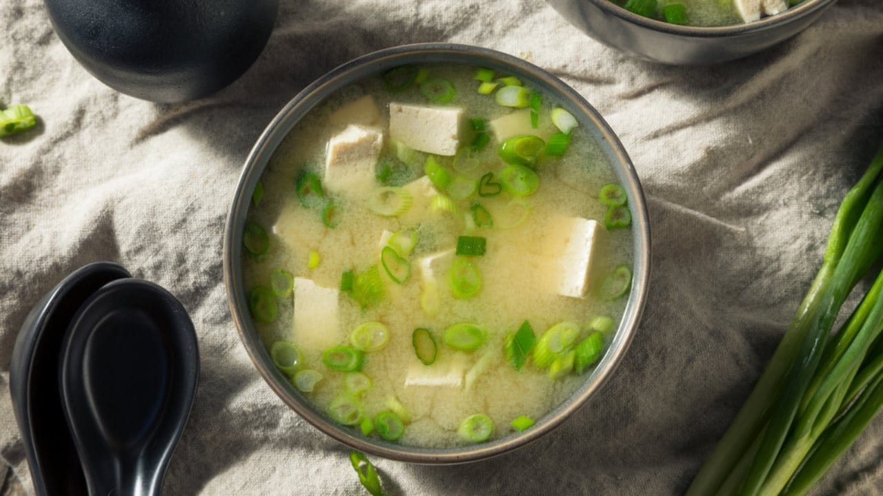 10 High-Protein Soups That Make Weight Loss Feel Like Comfort Food - Miso Soup with Tofu and Vegetables ss1658274955