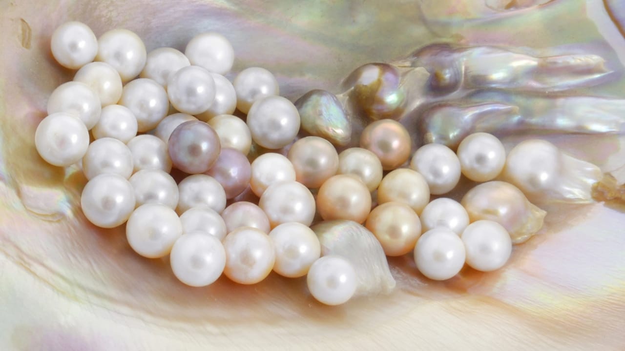 25 Most Popular Gemstones, Their Symbolism & Value 12 25 Most Popular Gemstones, Their Symbolism & Value - Pearl dp33275895