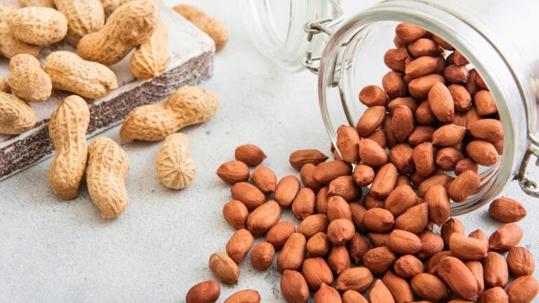 Raw Risks: 15 Foods That Pose Serious Health Hazards When Uncooked 9 Raw Risks: 15 Foods That Pose Serious Health Hazards When Uncooked - Raw peeled and whole peanut nuts ss2507142215