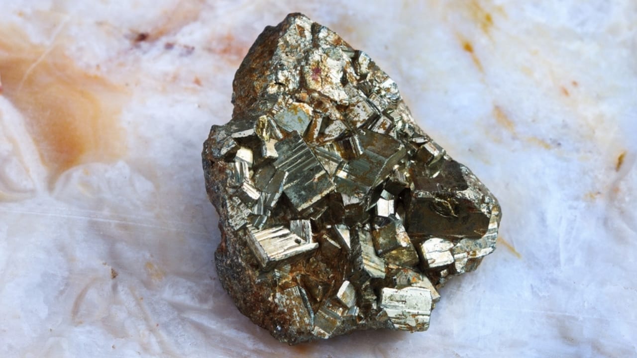 25 Most Popular Gemstones, Their Symbolism & Value 23 25 Most Popular Gemstones, Their Symbolism & Value - Raw pyrites mineral stones ss2474910759