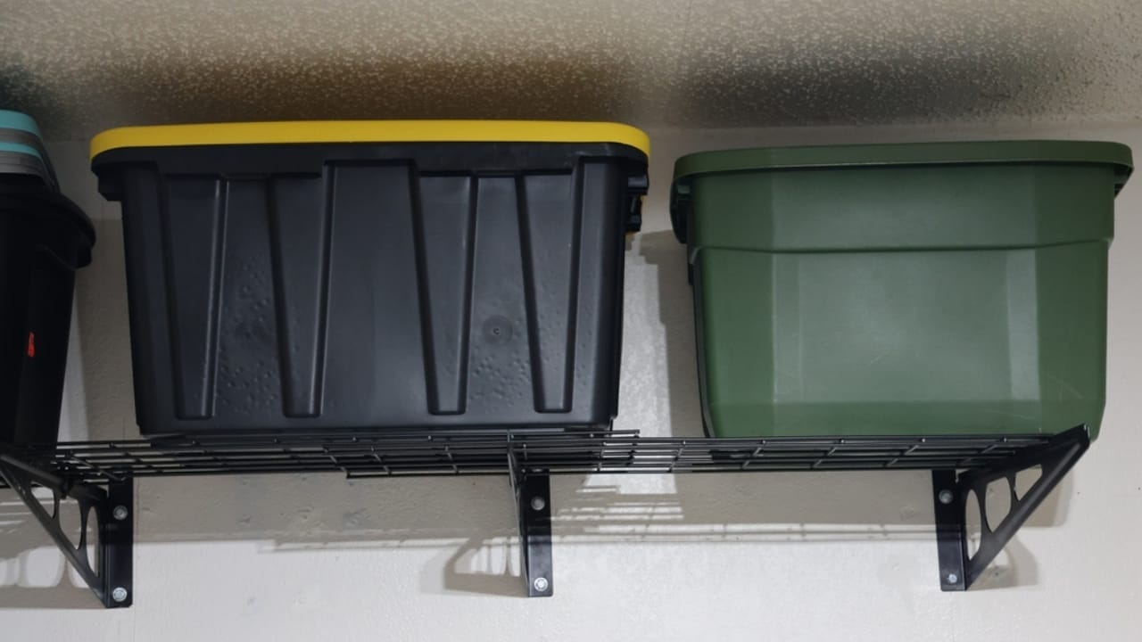 Maximize Your Garage Space with These 18 Simple DIY Organization Projects 3 Maximize Your Garage Space with These 18 Simple DIY Organization Projects - Storage Bins in Garage on Shelf ss2404448549