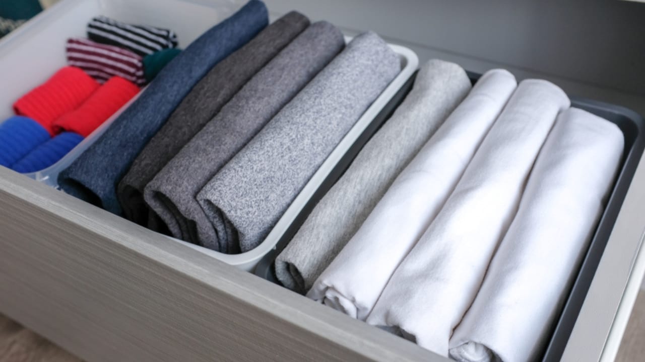 16 Space-Wasting Closet Items to Throw Out Right Now 7 16 Space-Wasting Closet Items to Throw Out Right Now - T shirts folded in drawer ss1311176516