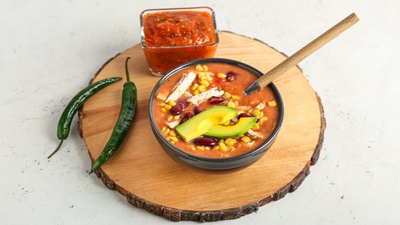 10 High-Protein Soups That Make Weight Loss Feel Like Comfort Food - White Bean Chicken Enchilada Soup ss2095316842