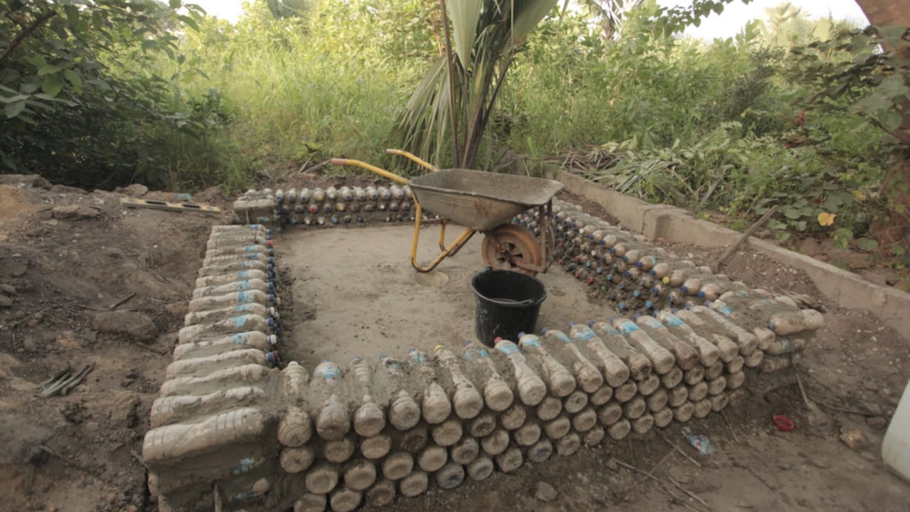 20 Creative Ways to Reuse Plastic Bottles in Your Home, Garden & Crafts - bottle brick building ss1449068666