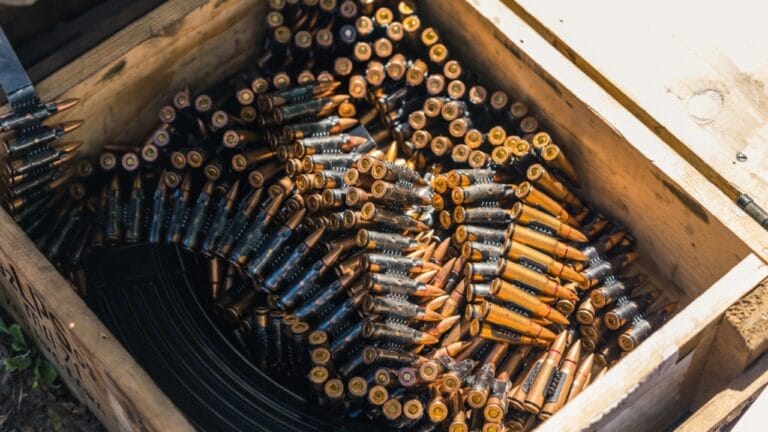 12 Tips to Store Ammo Safely & Maximize Longevity 2 12 Tips to Store Ammo Safely & Maximize Longevity - box of golden rifle bullet tapes for machine gun ss2194941037