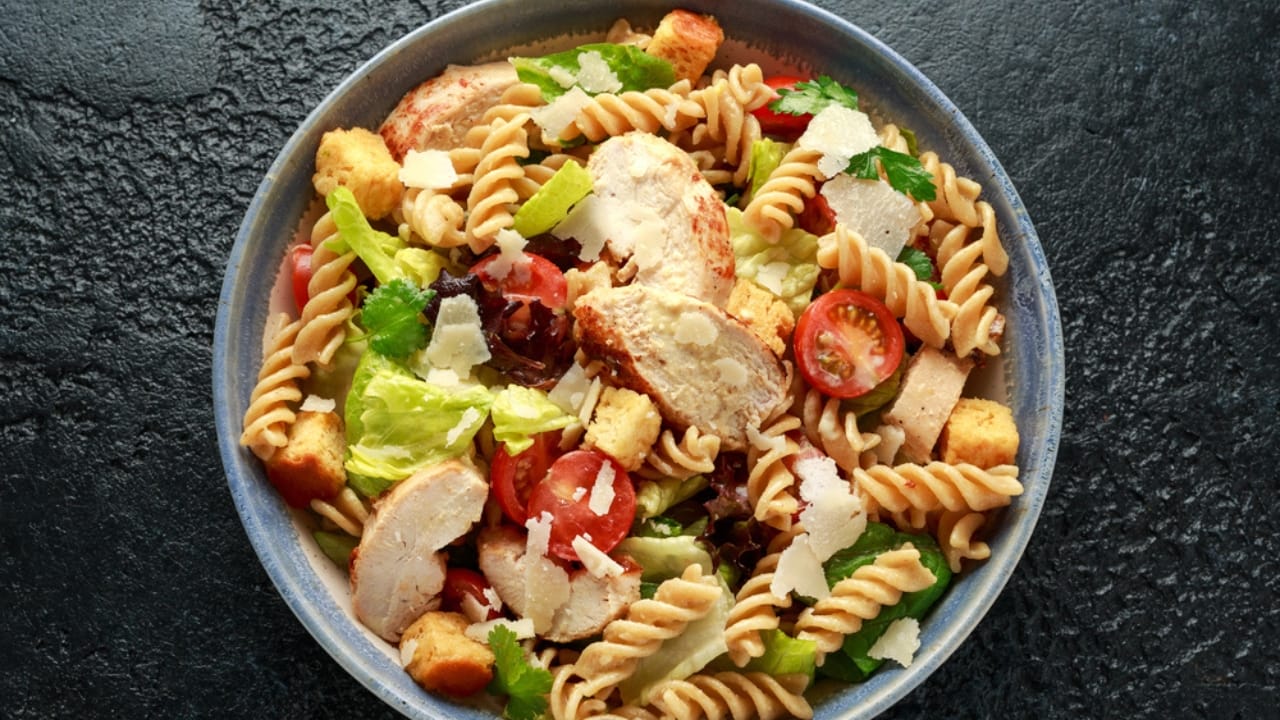 23 No-Fuss Dinner Recipes When You Don’t Want to Overthink It 5 23 No-Fuss Dinner Recipes When You Don’t Want to Overthink It - chicken caesar pasta salad dp307877508