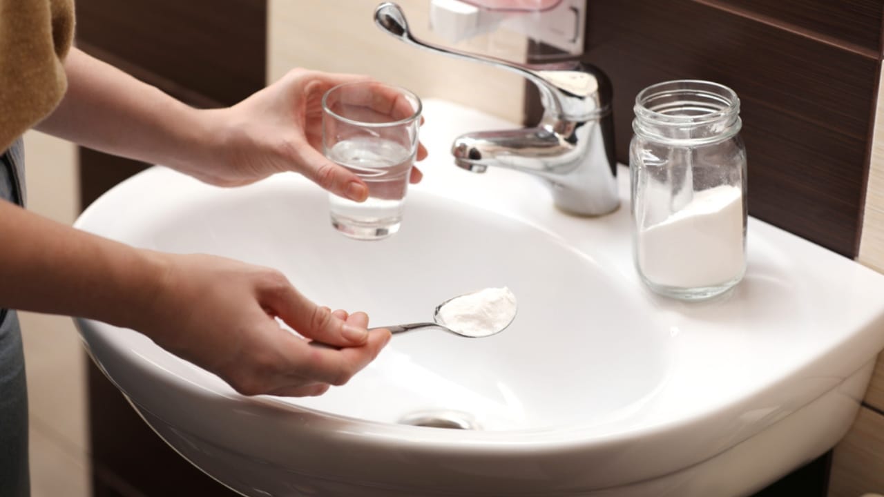 14 Natural Homemade Cleaners You Can Trust for a Chemical-Free Clean 17 14 Natural Homemade Cleaners You Can Trust for a Chemical-Free Clean - cleaning drain dp461962220