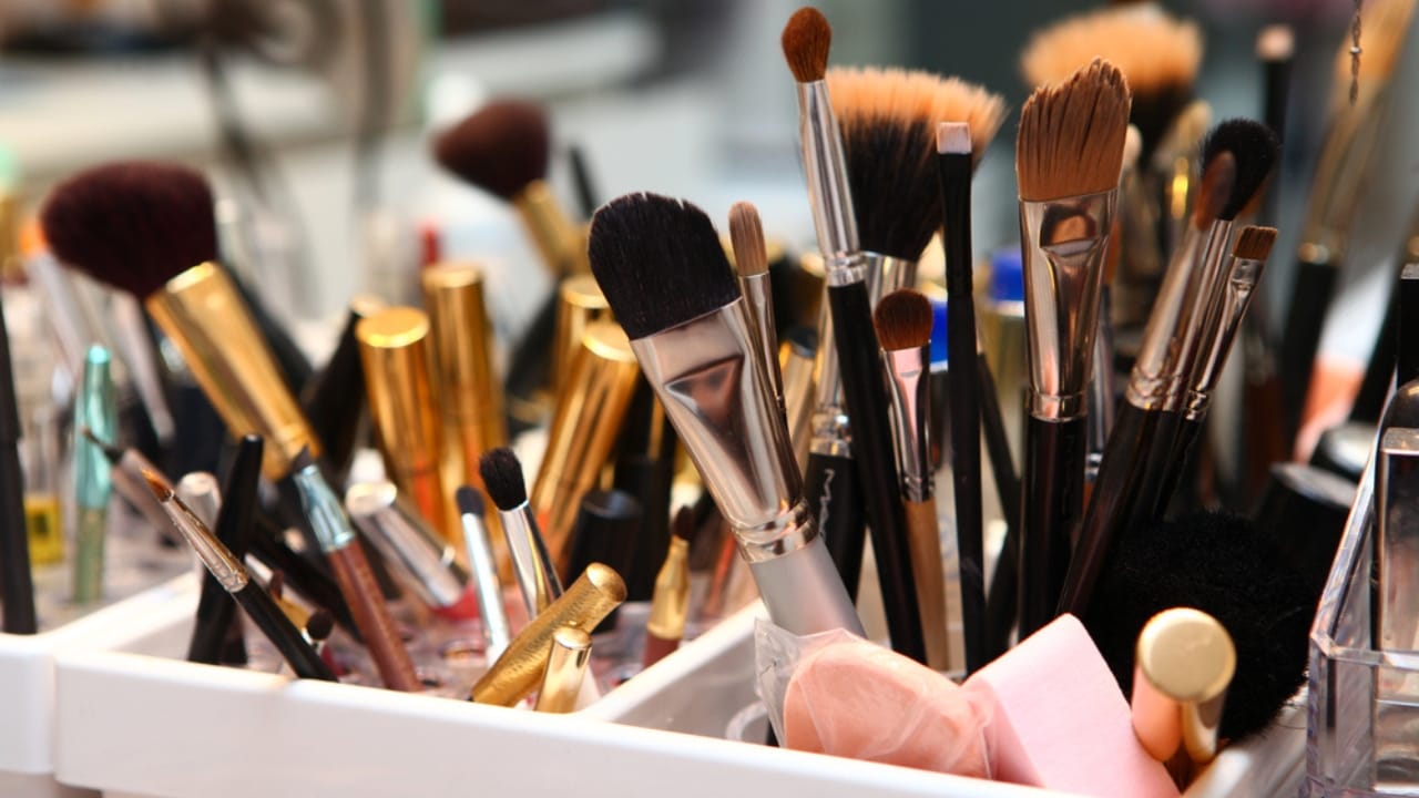 Stop Storing These 15 Things in the Bathroom—Here’s Why 7 Stop Storing These 15 Things in the Bathroom—Here’s Why - cosmetics in table makeup kit dp4203651