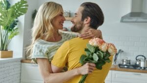 The Perfect Flower for Every Anniversary, From 1 to 50 1 The Perfect Flower for Every Anniversary, From 1 to 50 - couple with flowers ss2169222329