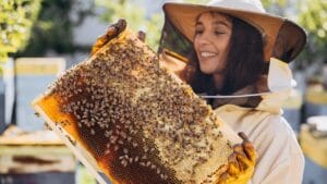Bee-Ready: 15 Tips Every New Beekeeper Should Know 1 Bee-Ready: 15 Tips Every New Beekeeper Should Know - female Beekeeper ss2495163657
