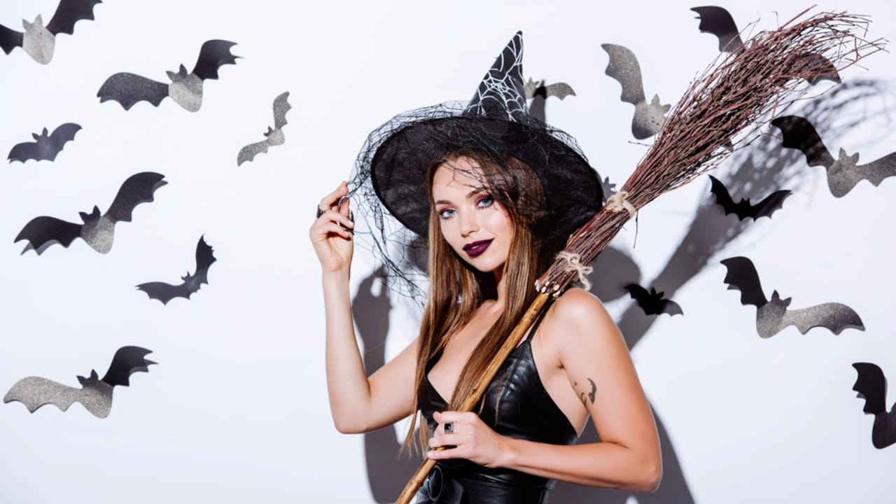 Craft Your Own Magical Halloween Witches' Broom: 2 Free DIY Methods 8 Craft Your Own Magical Halloween Witches' Broom: 2 Free DIY Methods - girl witch holding broom dp310715646