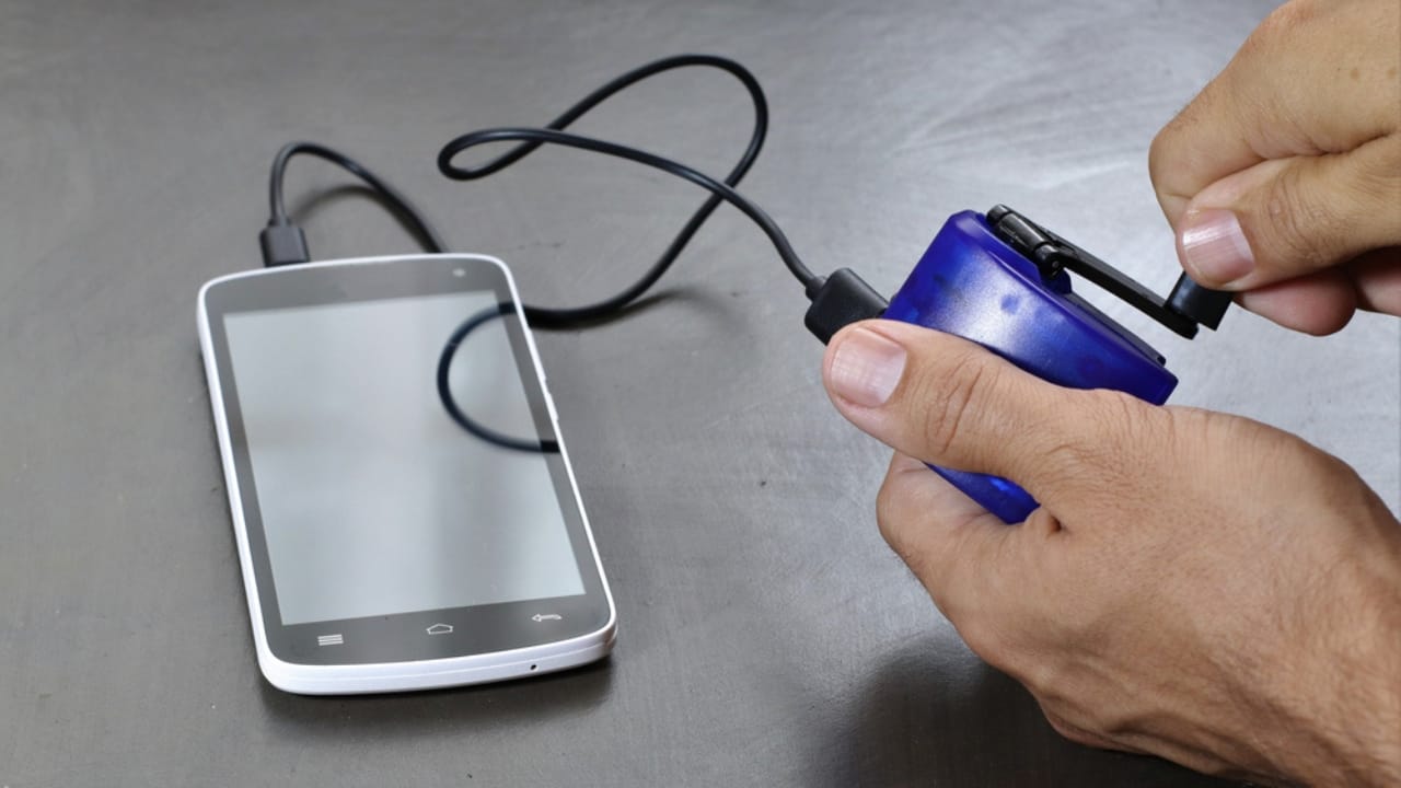 15 Supplies to Help You Survive & Thrive in Case of a Collapse - hand crank phone charger ss1698535180