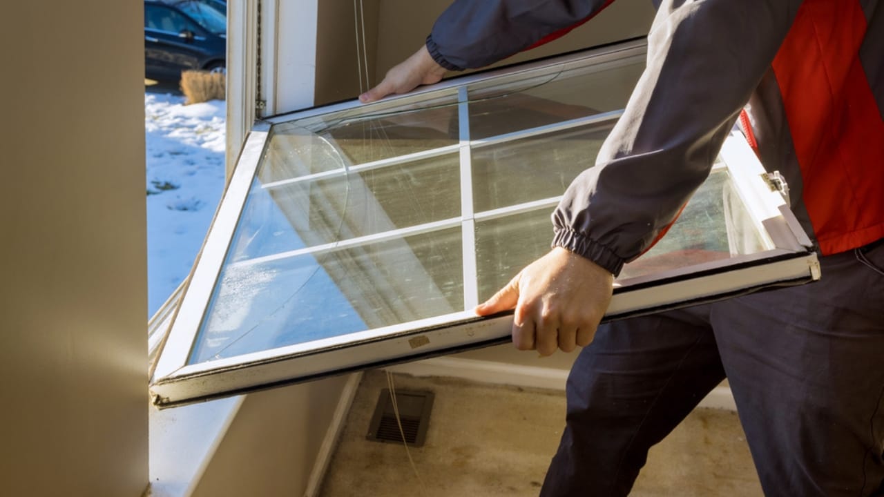 8 Ways Experts Insulate Windows and Doors Before a Freeze—and Why You Should Too - installing window dp455317368