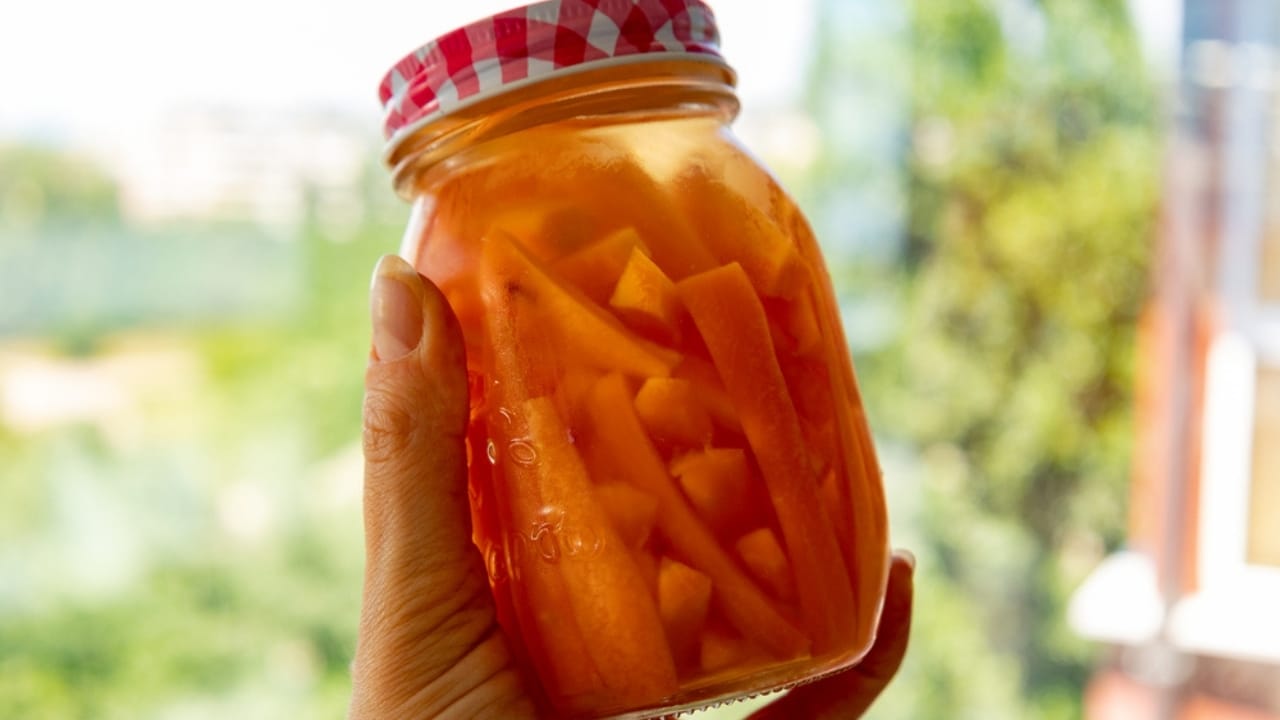 How to Can Carrots Like a Pro: Tips for Preserving & Saving Money 2 How to Can Carrots Like a Pro: Tips for Preserving & Saving Money - jar in carrots dp648692106