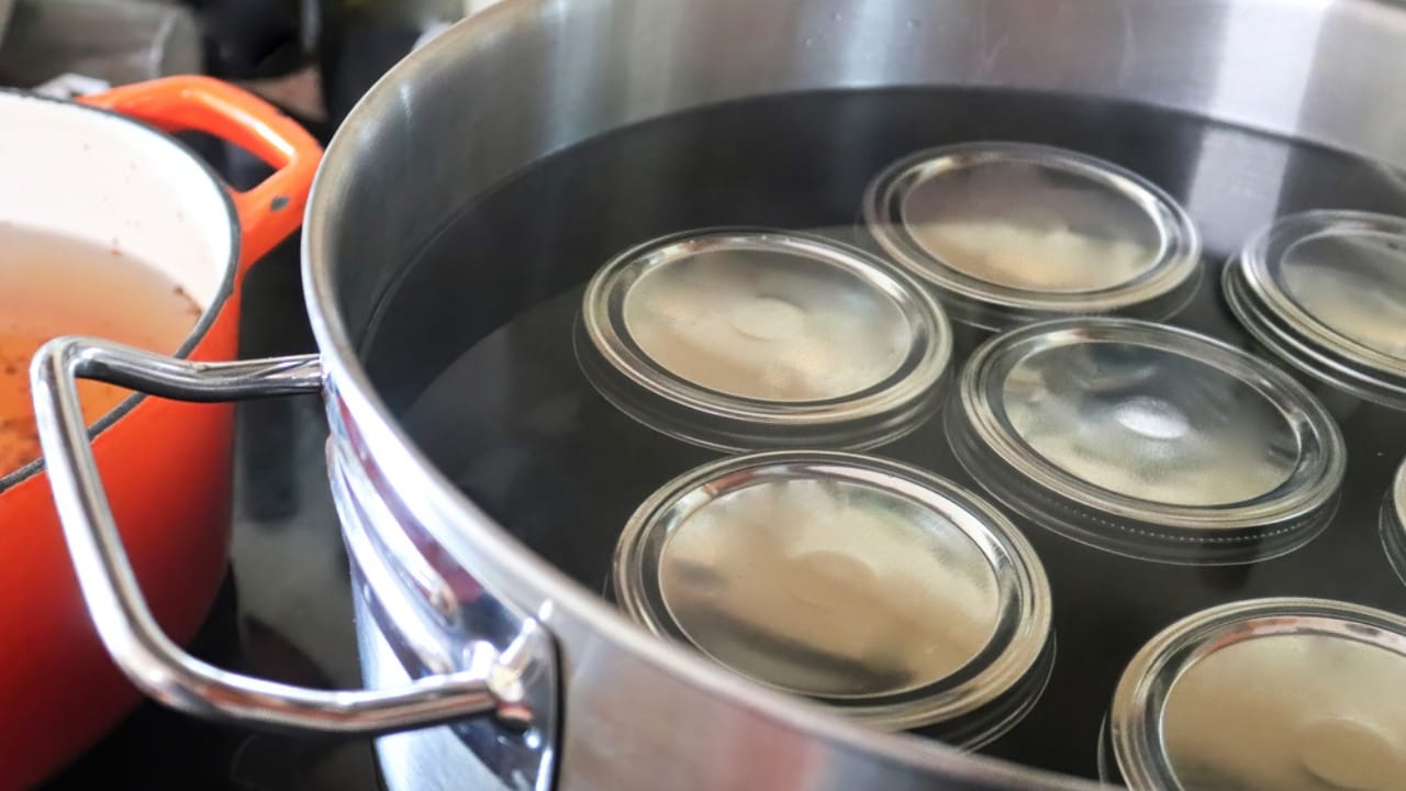 15 Canning Mistakes You Can’t Afford to Make - jar in water dp462344842